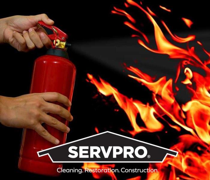 fire extinguisher spraying fire